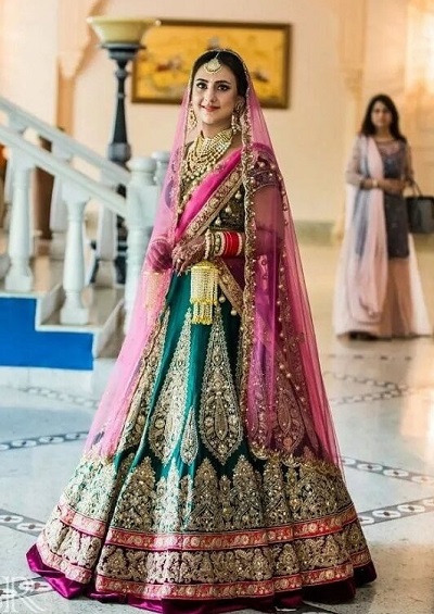 Green and pink color Punjabi style bridal dress