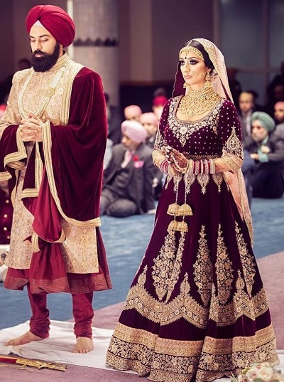 Maroon Deeply Embroidered Punjabi Bridal Dress