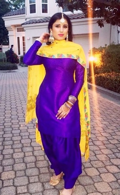 Purple Punjabi patiala salwar suit with yellow dupatta