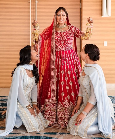 Red lehenga style gown for Punjabi bride