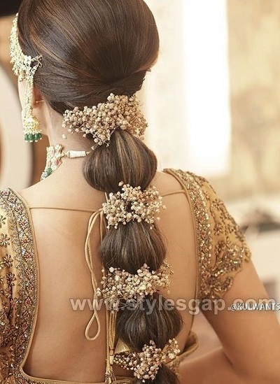 Beautiful jasmine braid with golden flower detailing