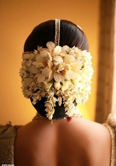Bridal low ban with white floral hairstyle