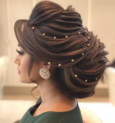Edgy bun hairstyle for lehengas for wedding