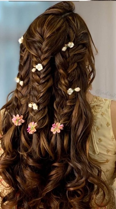 Multiple braids with floral decoration
