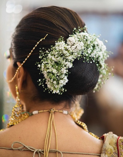 New design Amboda hairstyle with flowers for lehenga