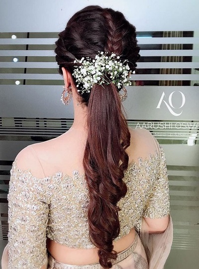 Simple ponytail gajra hairstyle for medium hair
