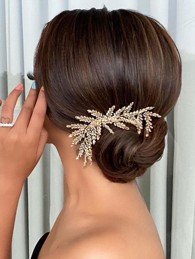 Twisted bun with hair clip hairstyle for Reception