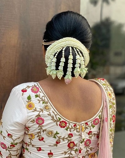 Unique hairstyle with designer gajra style