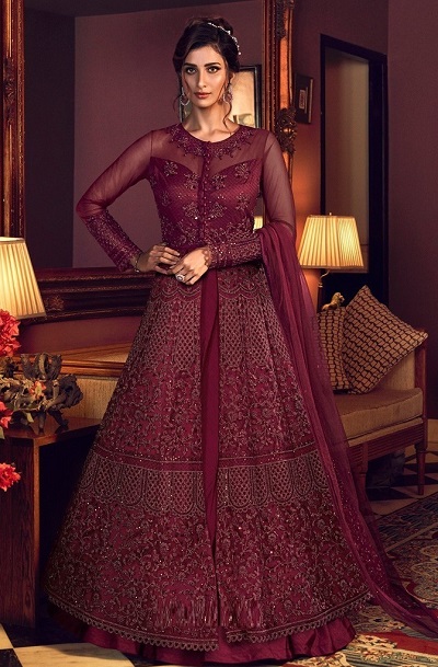 Wine colored heavily embellished net fabric gown