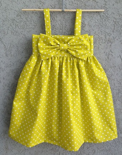 Polka Dotted Green Dress With Bow