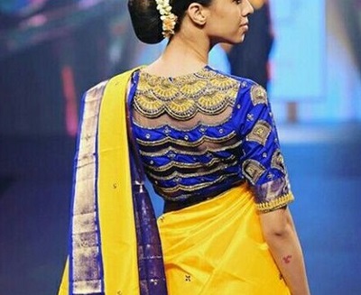Gorgeous blue heavy embroidered back blouse design