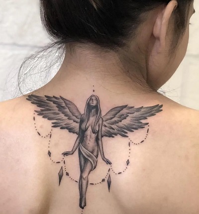 Angel with wings tattoo