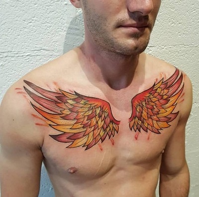 Angel’s Wing Colored Feather Chest Tattoo Design