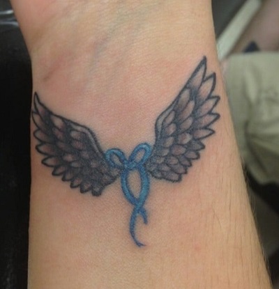 Colored Bow And Angel Wing Tattoo