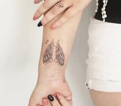 Double Winged Rest Tattoo Design
