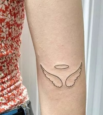 Elbow Angel wing tattoo