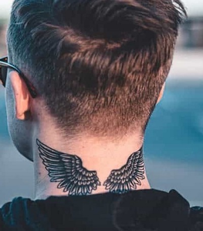 Nape Wing Tattoo For The Arm