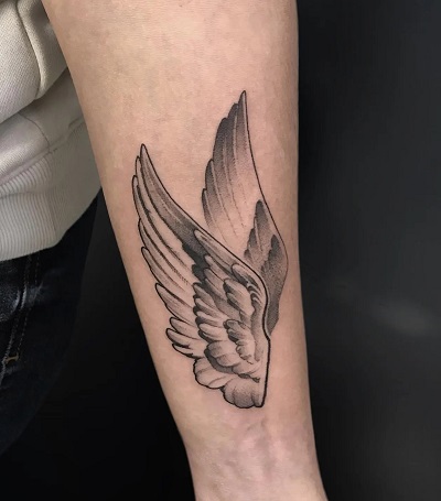 Shaded Arm Angel Wing Tattoo