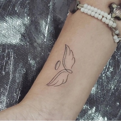 Simple Wrist Angel Wing Tattoo