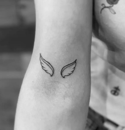 Small Simple Elbow Angel Wing Tattoo