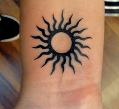 Sun Wrist Female Tattoo