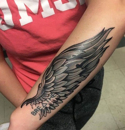 Dark Colored Angel Wing Tattoo