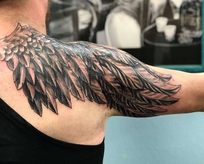 Shoulder Winged Feather Tattoo