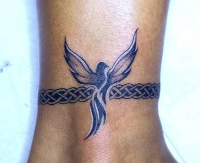 Bird and Celtic Knotted band tattoo