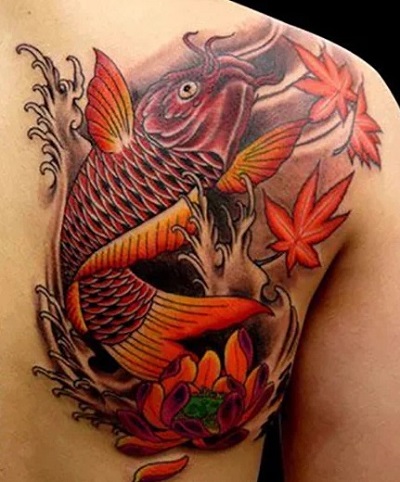 Orange koi fish shoulder tattoo