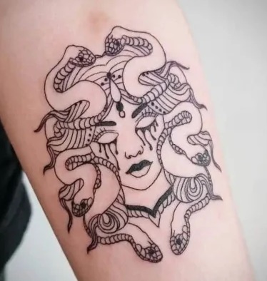 Bleeding medusa pattern tattoo
