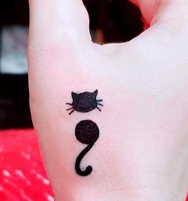 Cat Shaped Semi Colon Tattoo