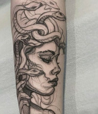 Elaborate Forearm Medusa tattoo