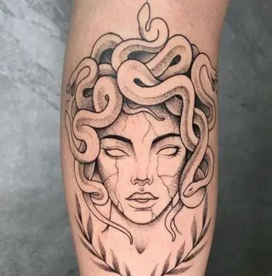 Forearm elaborate Medusa head tattoo