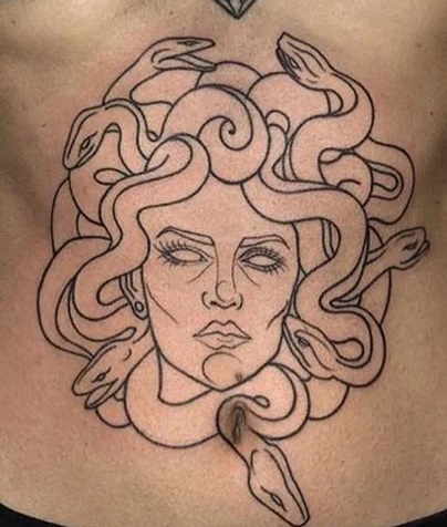Sternum Medusa tattoo For women