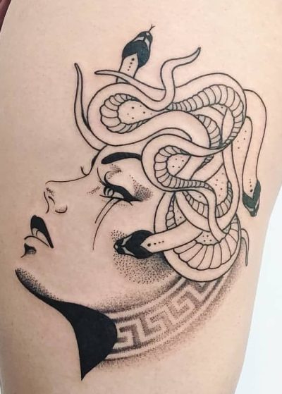 Thigh Half Medusa tattoo