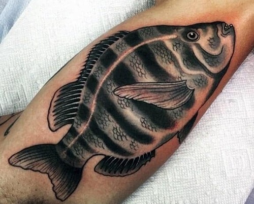 Bicep Tattoo With Fish Design
