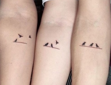 Cute forearm bird tattoo
