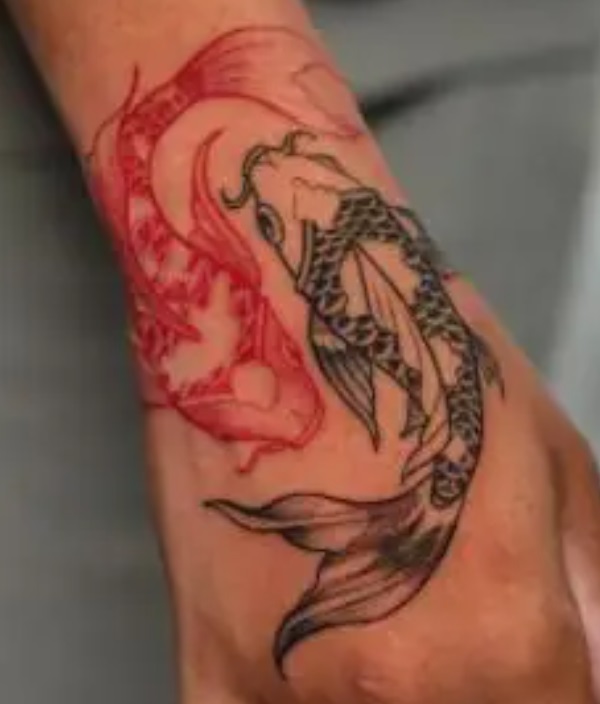 Hand Tattoo In Fish Design