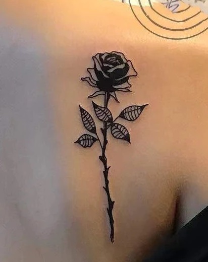 Lower Chest Rose Tattoo