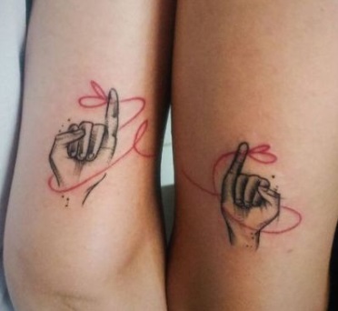 Pinky promise elbow tattoo