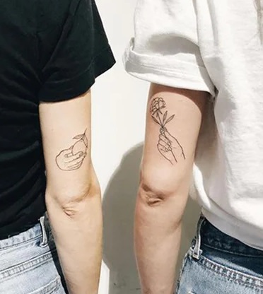 Sharing Friendship tattoo