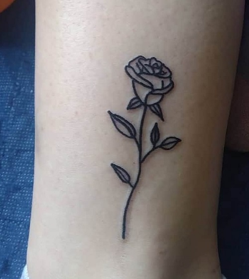 Simple Outlined Leg Rose Tattoo