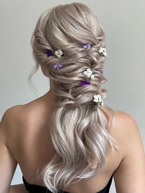 Twisted floral loose hair for wedding