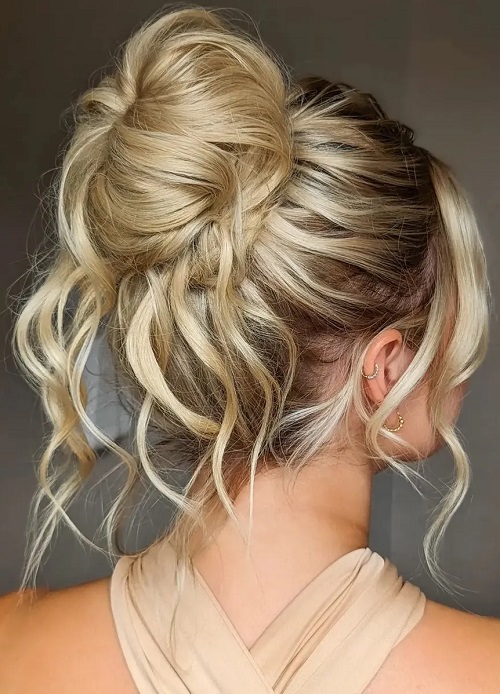 Weaved top knot wedding hairstyle