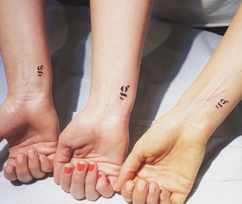 Wrist letter style Friendship tattoo