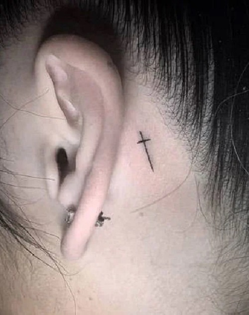 Cross Behind The Ear Tattoo