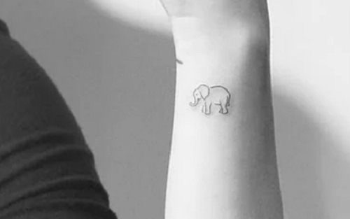 Cure Elephant Tattoo