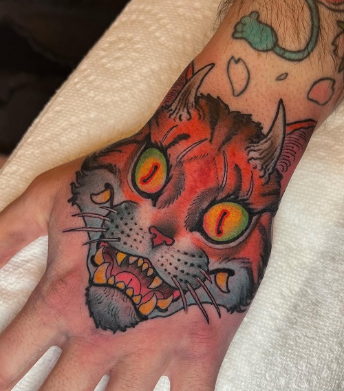 Ferocious Animal Hand Tattoo