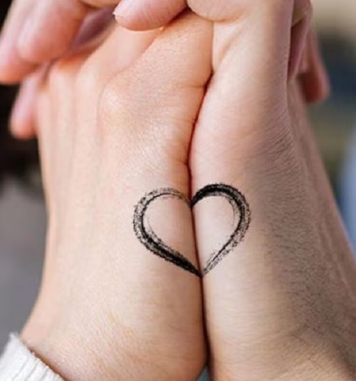 Half Part Heart Hand Tattoo