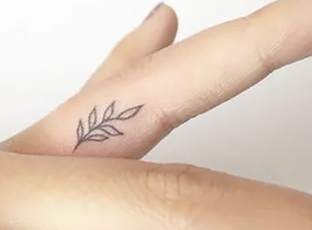 Inner Finger Tattoo